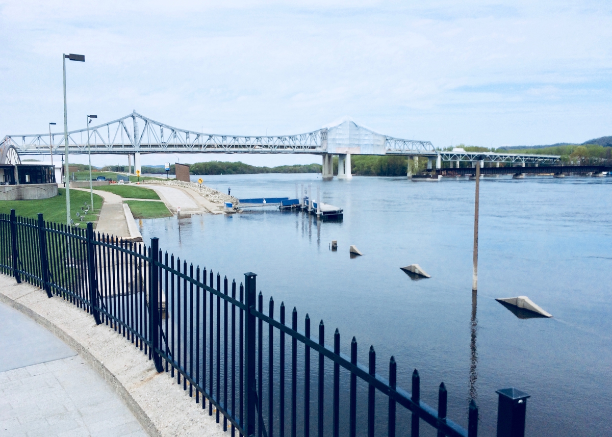 a view of the Mississippi from Levee Park, looking north, when the river has partially flooded the parkway in front of the levee